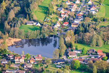 Village view with heart-shaped mill pond from the north in the district Schierschnitz in Föritztal in the state Thuringia, Germany