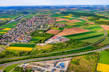 View of the town from the north, beyond the A70 motorway in Bergrheinfeld in the state Bavaria, Germany