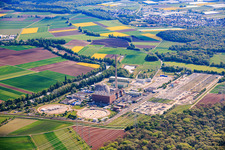 Decommissioned nuclear power plant Grafenrheinfeld of Preussenelektra GmbH on the banks of the Main River with Castor storage in the "gymnasium" and large substation in Grafenrheinfeld in the state Bavaria, Germany