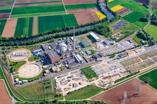 Decommissioned nuclear power plant Grafenrheinfeld of Preussenelektra GmbH on the banks of the Main River with Castor storage in the "gymnasium" and large substation in Grafenrheinfeld in the state Bavaria, Germany