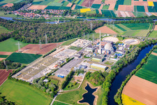 Decommissioned nuclear power plant Grafenrheinfeld of Preussenelektra GmbH on the banks of the Main River with Castor storage in the "gymnasium" and large substation in Grafenrheinfeld in the state Bavaria, Germany