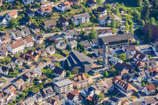 Main street with St. John the Baptist Church in the district Tennenbronn in Schramberg in the state Baden-Wuerttemberg, Germany