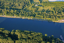 Motorhome parking area on the banks of the Rhine in the district Leopoldshafen in Eggenstein-Leopoldshafen in the state Baden-Wuerttemberg, Germany
