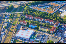 Residential developments and Pepperl+Fuchs Vertrieb Deutschland GmbH in Franz-Grashof-Straße from the west in the district Neckarau in Mannheim in the state Baden-Wuerttemberg, Germany