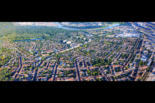 Panorama of the district from the east to the Stollenwörthweiher pond and the park island across the Rhine. in the district Almenhof in Mannheim in the state Baden-Wuerttemberg, Germany