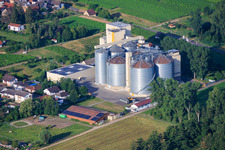 Silos and production buildings of the Cornexo GmbH mill from the northeast in Freimersheim in the state Rhineland-Palatinate, Germany