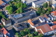 Construction site of the new cafeteria building for the Ludwig-Riedinger Elementary School, commissioned by the municipality of Kandel. Architects: zwo/elf PartmbB. Earthworks: Gaudier Erd- und Rückbau GmbH. Window work: Trumpf Metallbau GmbH. Landscape architecture: Bauer.Landschaftsarchitekten. Building services: Bender+Urich GmbH & Co.KG. Structural engineering: Ingenieurbüro Sikora. Facade work: AS-Fassaden GmbH. Shell construction: Wünschel BAU GmbH. Electrical work: Wieland & Schultz GmbH. Rhineland-Palatinate Ministry of Education, Science, Continuing Education and Culture in Kandel in the state Rhineland-Palatinate, Germany