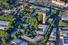 The Plant High-Tech Park Mannheim and Carlo Schmid School Mannheim with Historic Water Tower, Schildkröt Company in the district Neckarau in Mannheim in the state Baden-Wuerttemberg, Germany
