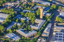 The Plant High-Tech Park Mannheim and Carlo Schmid School Mannheim with Historic Water Tower, Schildkröt Company in the district Neckarau in Mannheim in the state Baden-Wuerttemberg, Germany