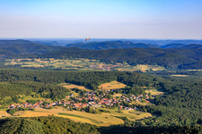 Village view from the east with paraglider in Climbach in the state Bas-Rhin, France