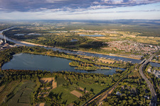 Low water on the Rhine between the Rhine bridges and the power plant beyond Knielinger See in the district Knielingen in Karlsruhe in the state Baden-Wuerttemberg, Germany