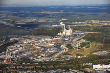 Rhine ports Karlsruhe and West Landfill (Energy Hill) with two wind turbines in front of the steam power plant Karlsruhe, viewed from the east in the district Mühlburg in Karlsruhe in the state Baden-Wuerttemberg, Germany