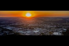 Sunset over the industrial area in the district Zone Industrielle du Grand Bois Fayencerie in Saargemünd in the state Moselle, France