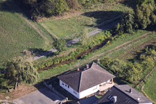 Landrat-Pfeifer-Straße and the Richerbach stream in the district Sickenhofen in Babenhausen in the state Hesse, Germany