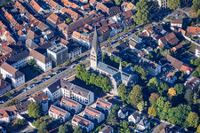 Pforzheimer Straße with Herz-Jesu-Kirche (Church of the Sacred Heart) in Ettlingen in the state Baden-Wuerttemberg, Germany