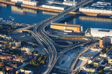 Ramp to the Kurt-Schumacher-Brücke (bridge) over the Rhine to Mannheim (B44), featuring Rheinuferstraße and the ZG Raiffeisen grain silo on the riverbank (following the demolition of the "Würfelbunker" and the Rathaus-Center) in the district Hemshof in Ludwigshafen in the state Rhineland-Palatinate, Germany