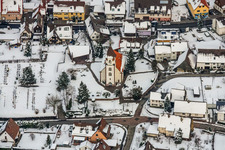Wintry snowy Church building Evangelic Church in Ottenhausen in the state Baden-Wurttemberg, Germany