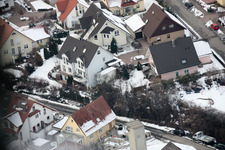Mühlgasse in winter with snow in the district Gräfenhausen in Birkenfeld in the state Baden-Wuerttemberg, Germany