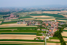 Village - view on the edge of agricultural fields and farmland in Stundwiller in Grand Est, France