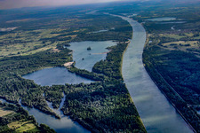 Channel flow and river banks of the waterway shipping on the Rhine river near Goldkanal in Elchesheim-Illingen in the state Baden-Wurttemberg
