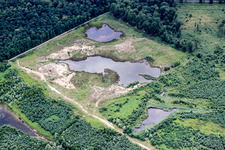 Bank areas of a flooded former dismantling of opencast mining and renaturierungs-lake in Foret de Haguenau in Grand Est, France
