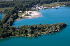 Fisherman's home, beach and Heidelberg Materials Mineralik at the Giessen quarry lake in the district Liedolsheim in Dettenheim in the state Baden-Wuerttemberg, Germany