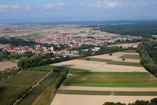Aerial photograpy of Village - view on the edge of agricultural fields and farmland in Hoerdt in the state Rhineland-Palatinate