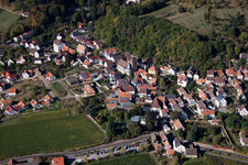 Aerial photograpy of Village - view on the edge of agricultural fields and farmland in Gleisweiler in the state Rhineland-Palatinate