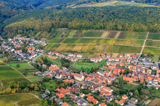 View of a winegrowers' village from the east with the Catholic Church of the Apostles Simon and Jude below the Gottesacker vineyard in the district Pleisweiler in Pleisweiler-Oberhofen in the state Rhineland-Palatinate, Germany