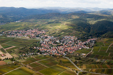View of the winegrowers' village from the north and the Sonnenberg vineyard in the district Rechtenbach in Schweigen-Rechtenbach in the state Rhineland-Palatinate, Germany