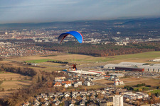 Paraglider in front of the DM Arena in the district Forchheim in Rheinstetten in the state Baden-Wuerttemberg, Germany