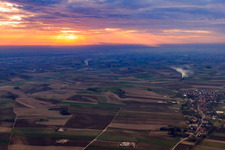 Fields and meadows seen from the east at sunset in Niederlauterbach in the state Bas-Rhin, France