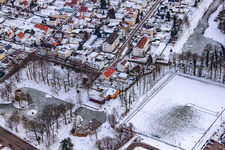 Aerial view of Swan pond frozen in winter in Kandel in the state Rhineland-Palatinate, Germany