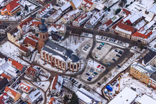 Market Square, Church in winter with snow in Kandel in the state Rhineland-Palatinate, Germany