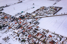 Oblique view of Gänsried in winter with snow in Freckenfeld in the state Rhineland-Palatinate, Germany