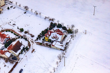 Aerial photograpy of Game reserve at the Gasthaus zur Brauerei in snow in Freckenfeld in the state Rhineland-Palatinate, Germany