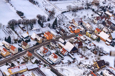 In the farm fields in winter in the snow in the district Kleinsteinfeld in Niederotterbach in the state Rhineland-Palatinate, Germany