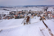 Village view from the south in winter in the snow in Dierbach in the state Rhineland-Palatinate, Germany