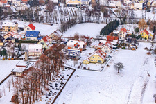 Aerial view of Cemetery in the snow in Dierbach in the state Rhineland-Palatinate, Germany
