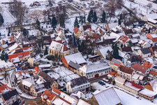 Church in the snow in Barbelroth in the state Rhineland-Palatinate, Germany