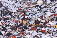 Aerial view of Main street in winter in the snow in Barbelroth in the state Rhineland-Palatinate, Germany