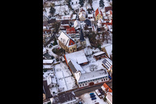 Oblique view of Church in the snow in Barbelroth in the state Rhineland-Palatinate, Germany