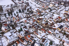Aerial photograpy of Main street in winter in the snow in Barbelroth in the state Rhineland-Palatinate, Germany