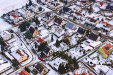Schützenstraße in the snow in Barbelroth in the state Rhineland-Palatinate, Germany