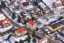 Town center in winter with snow in Hergersweiler in the state Rhineland-Palatinate, Germany