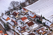 Konrad-Hofmann-Straße in the snow in Hergersweiler in the state Rhineland-Palatinate, Germany