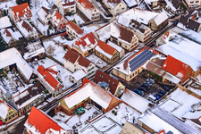 Raiffeisenstraße in the snow in Winden in the state Rhineland-Palatinate, Germany