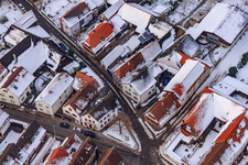 Aerial photograpy of Raiffeisenstraße x Hauptstraße in snow in Winden in the state Rhineland-Palatinate, Germany