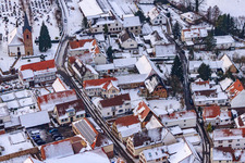 Raiffeisenstraße x Kirchstraße in snow in Winden in the state Rhineland-Palatinate, Germany