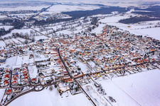 Aerial view of View of the town from the southwest in snow in Steinweiler in the state Rhineland-Palatinate, Germany